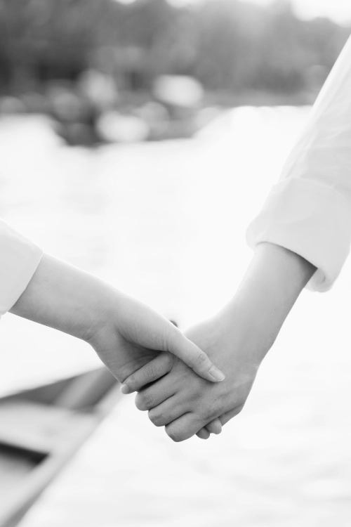 Couple holding hands